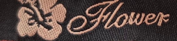 clothing labeled Flower with RN# 108892