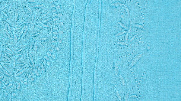 Malibu Blue Embroidered Sleeveless Asymmetrical Hem Top