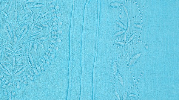 Malibu Blue Embroidered Sleeveless Asymmetrical Hem Top